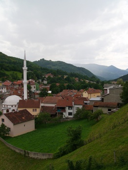 Featured is a photo of an unidentified village in Kosovo ... does anyone know where it is?  "Contact Us" if you know ... Photo by Romanian photographer Zsombor Benko.